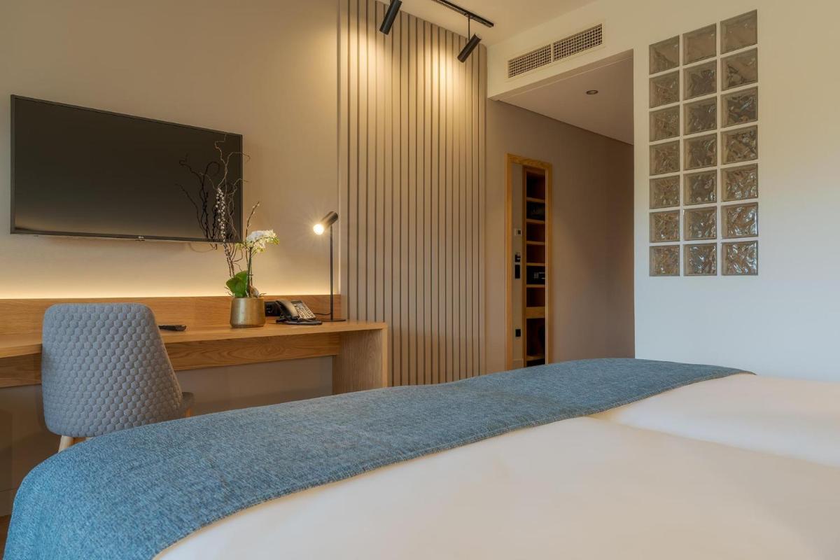 Uma cama ou camas num quarto em Sentido Galosol