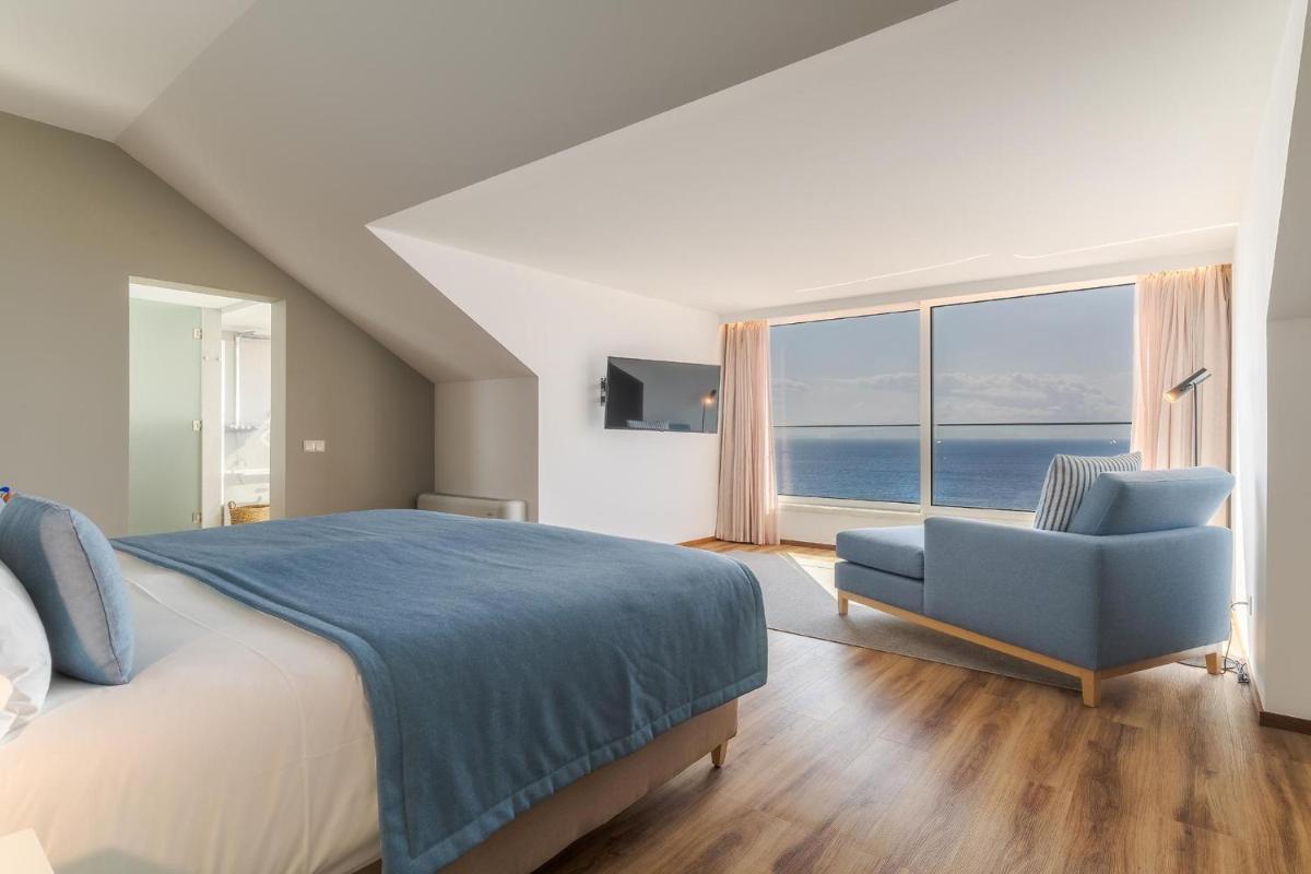 Uma cama ou camas num quarto em Sentido Galosol