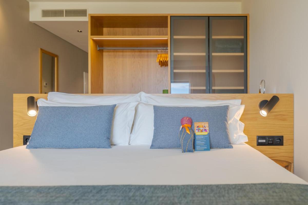 Uma cama ou camas num quarto em Sentido Galosol