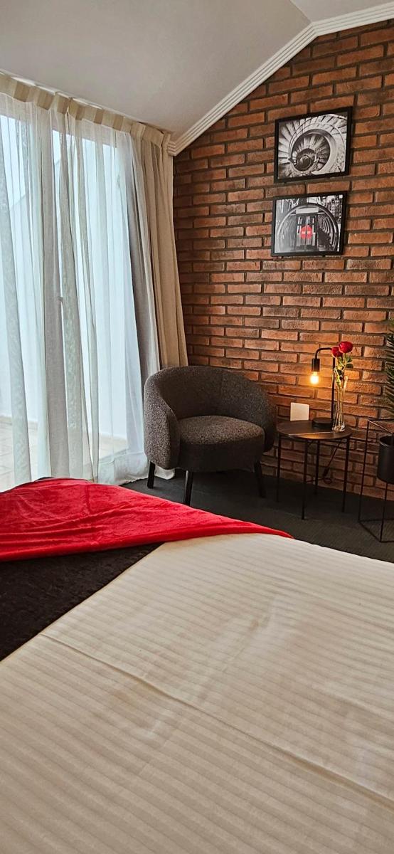 Cama o camas de una habitación en Hotel Spa El Muelle de Suances