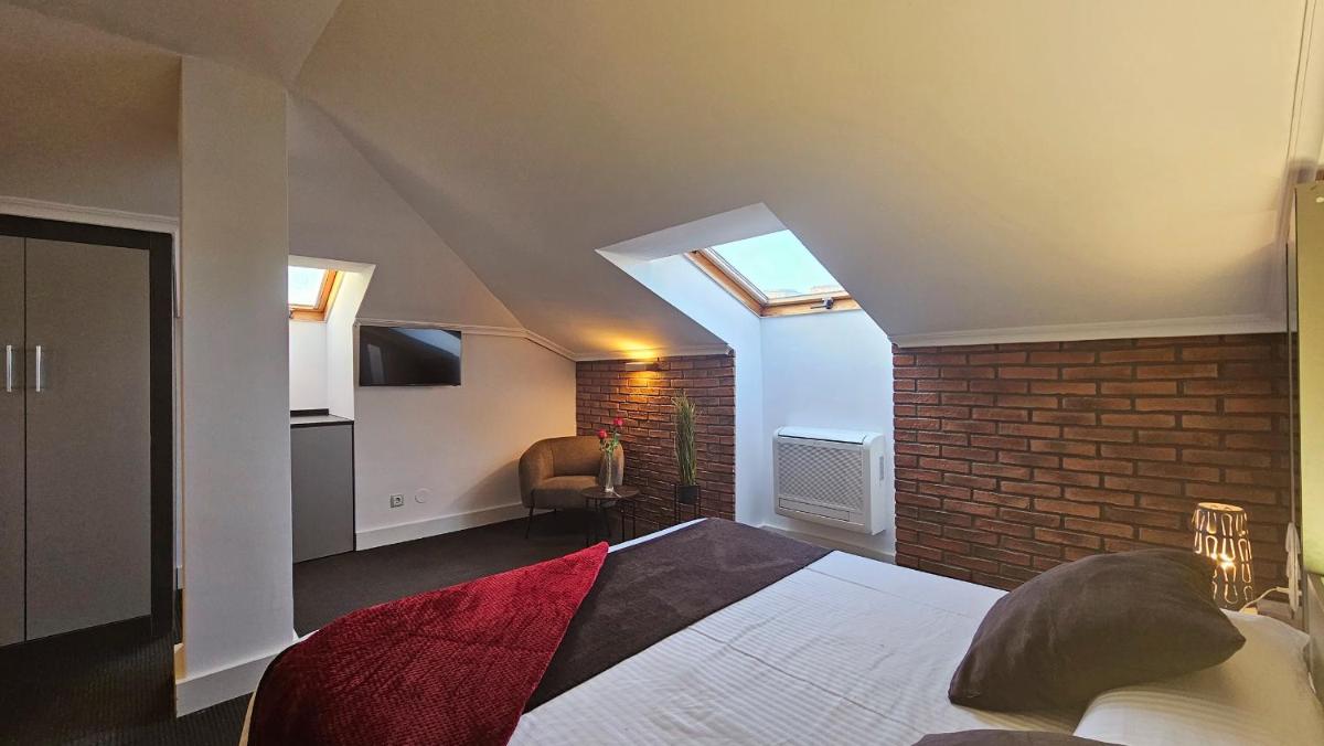 Cama o camas de una habitación en Hotel Spa El Muelle de Suances