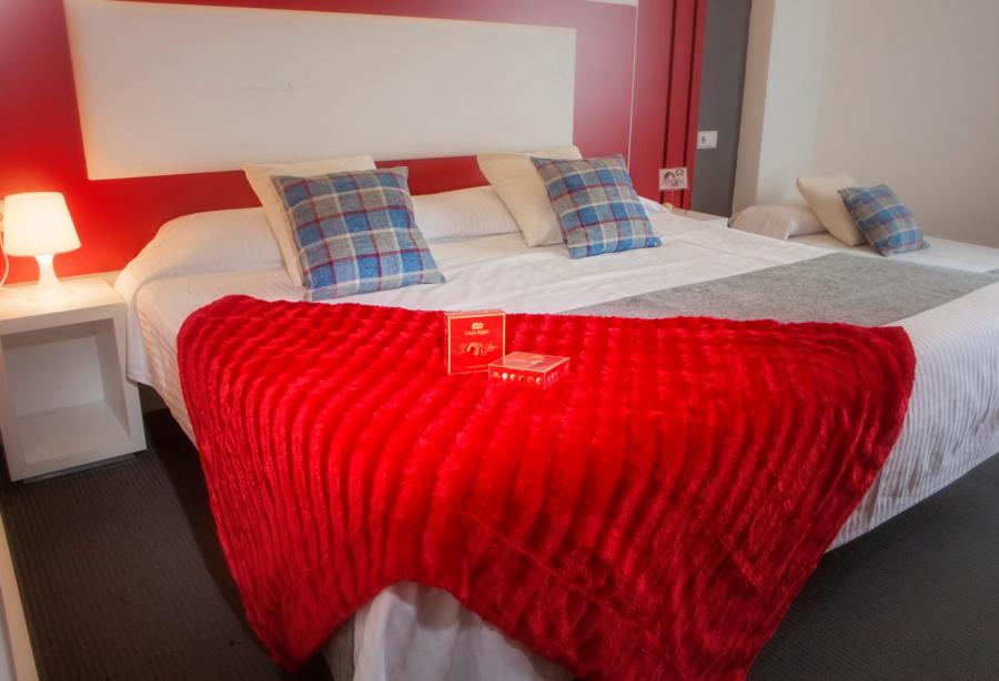 Cama o camas de una habitación en Hotel Spa El Muelle de Suances