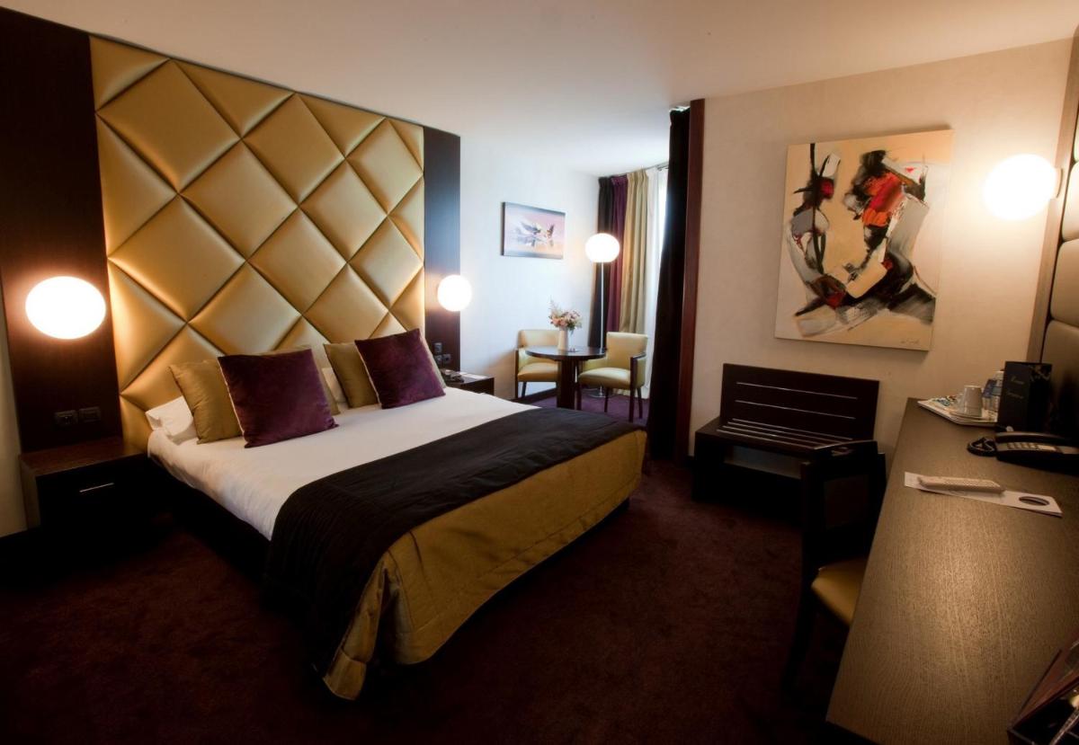Un ou plusieurs lits dans un hébergement de l'établissement Hotel Palladia