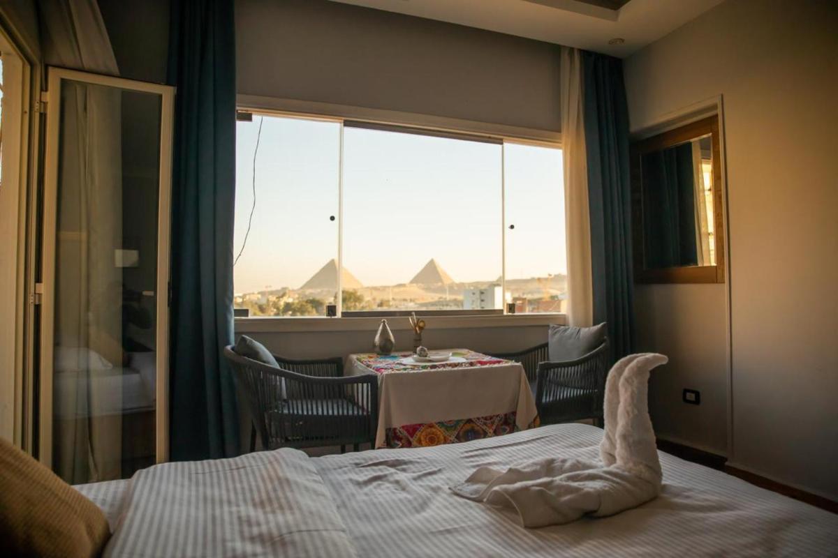 Suitetrails - King Tout Hotel Pyramids view