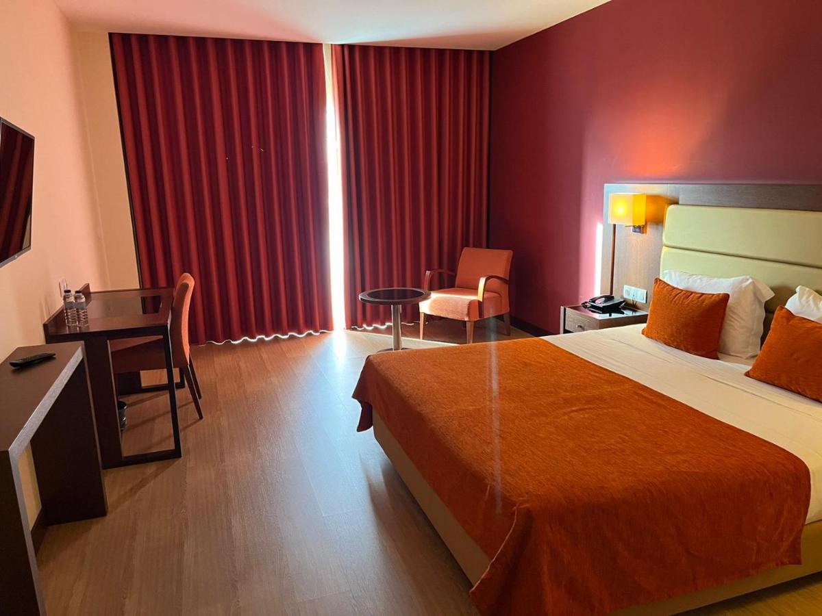Uma cama ou camas num quarto em Palace Hotel & SPA Termas do Bicanho