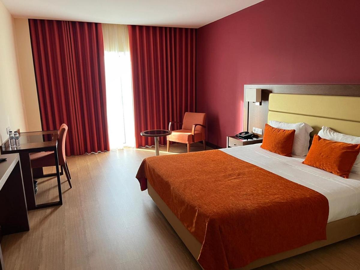 Uma cama ou camas num quarto em Palace Hotel & SPA Termas do Bicanho