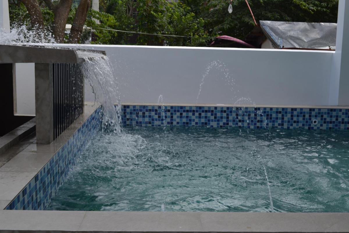Estraha Hotspring Resort with the perfect view of Mt Makiling - Housity