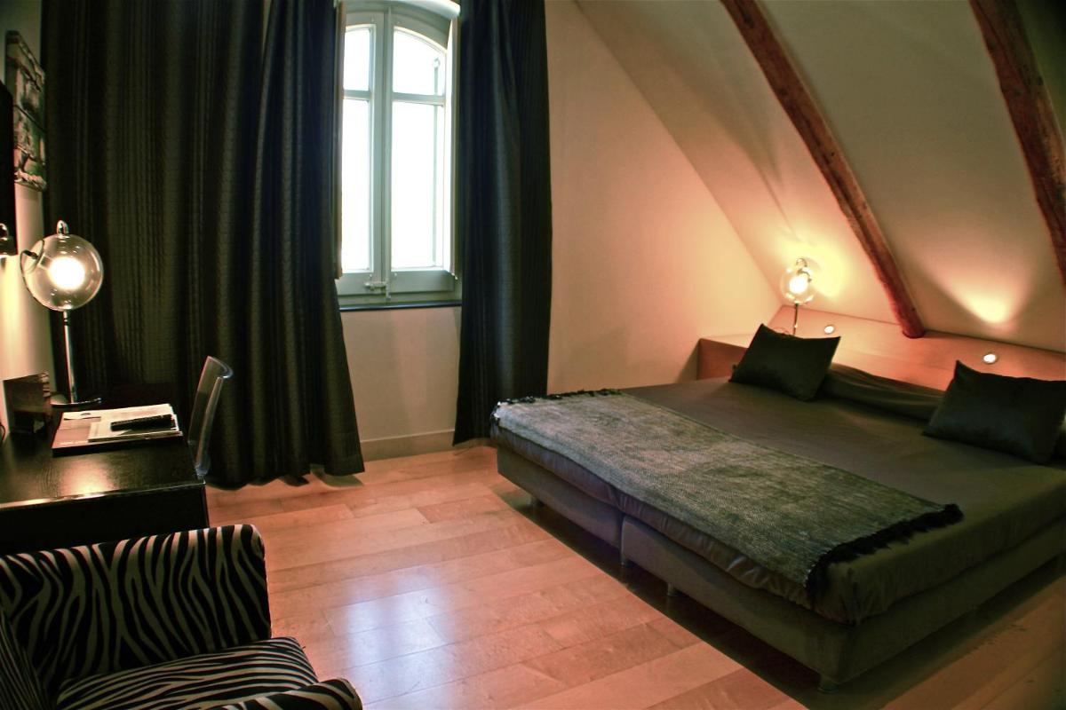 Cama o camas de una habitación en Hotel Sant Roc