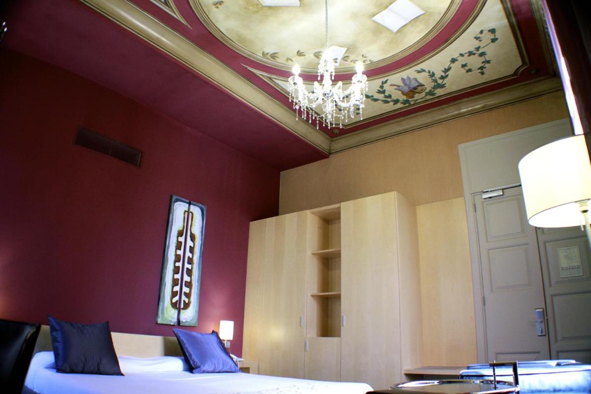 Cama o camas de una habitación en Hotel Sant Roc