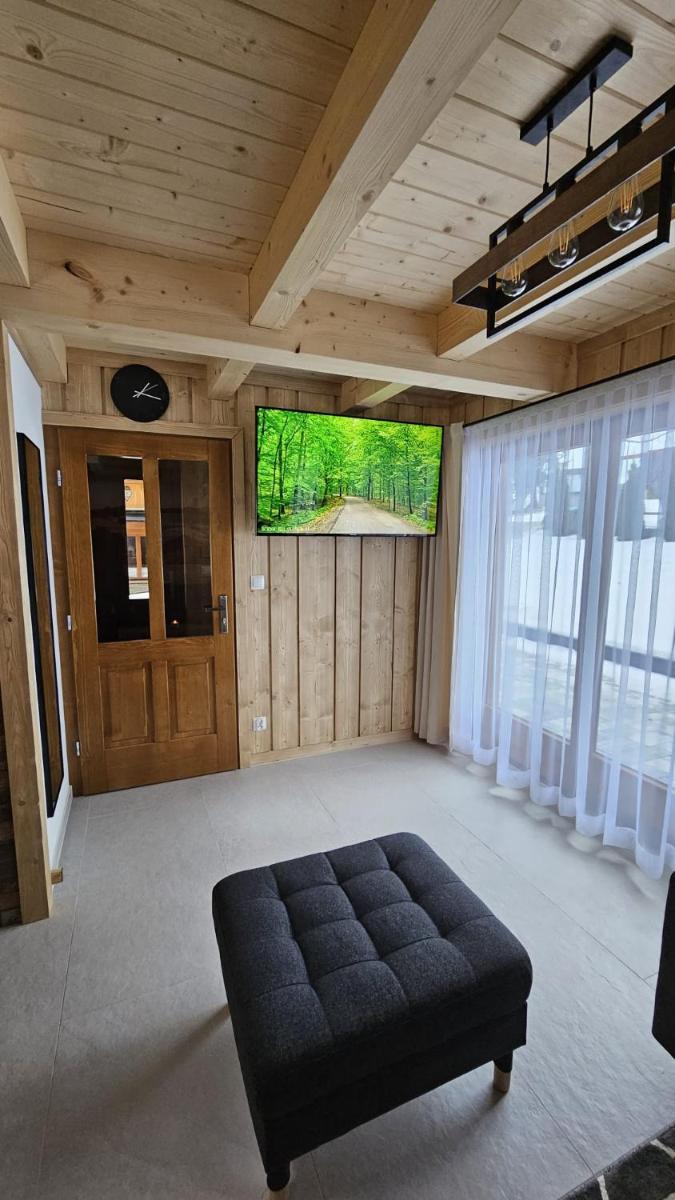 Domek na szczycie - Housity