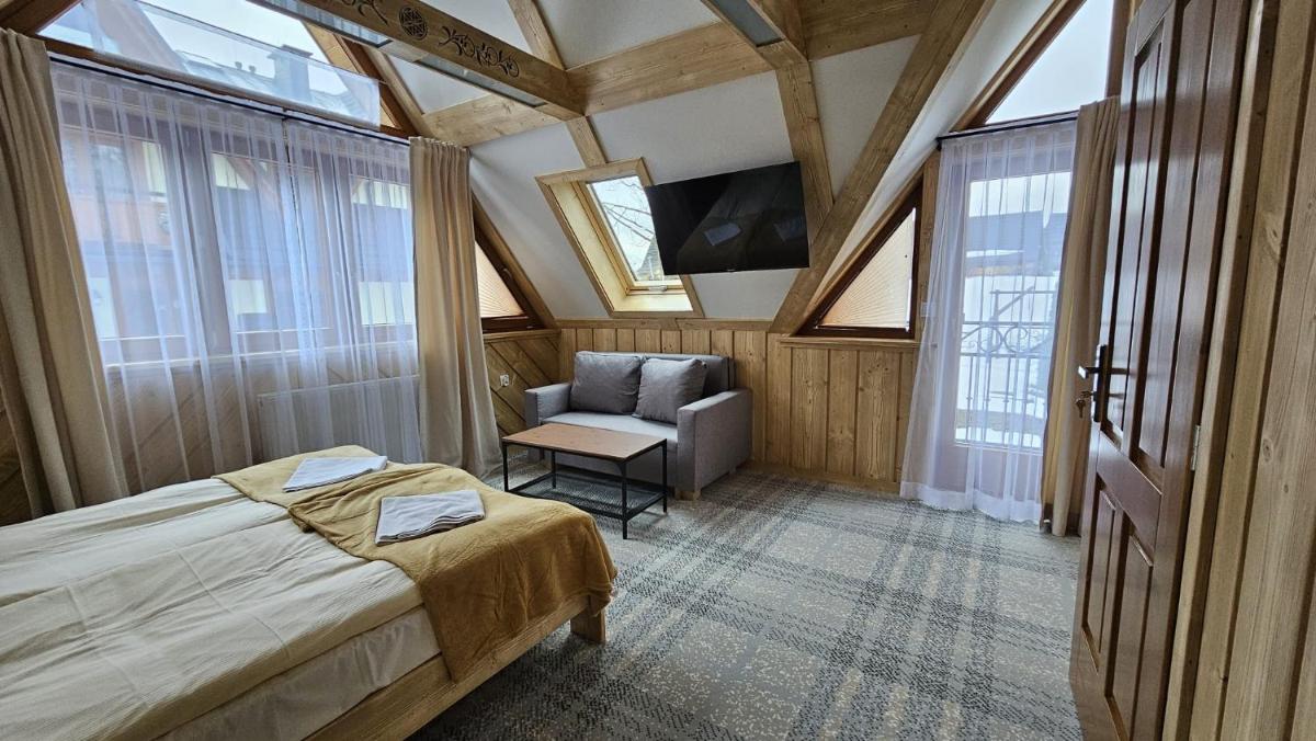 Domek na szczycie - Housity