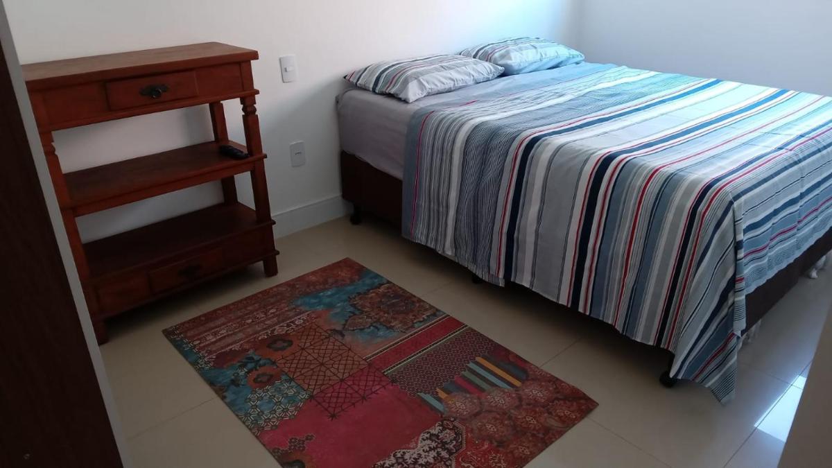 Suitetrails - Apto na praia de Palmas, climatizado, com piscina, próximo ao mar e com jardim privativo