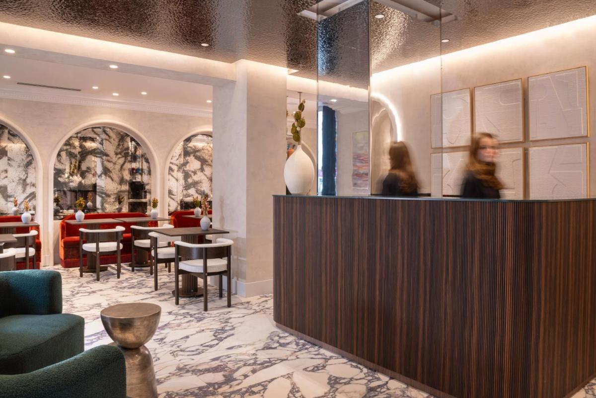 Coin salon dans l'établissement Hotel des Carmes by Malone