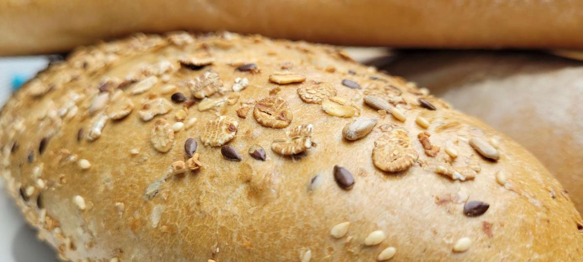 a close up of a bun with seeds on it at Radisson Blu Hotel, Greater Noida in Greater Noida