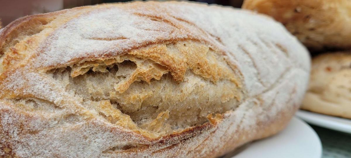 a close up of a piece of bread on a plate at Radisson Blu Hotel, Greater Noida in Greater Noida