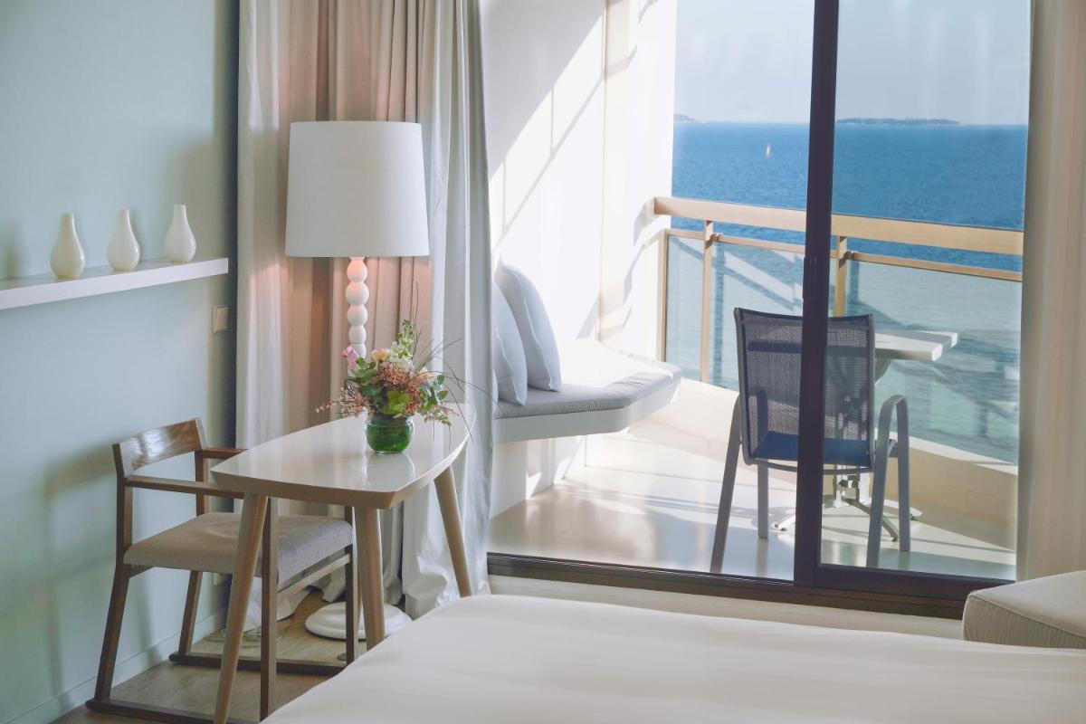 Un ou plusieurs lits dans un hébergement de l'établissement Pullman Cannes Mandelieu