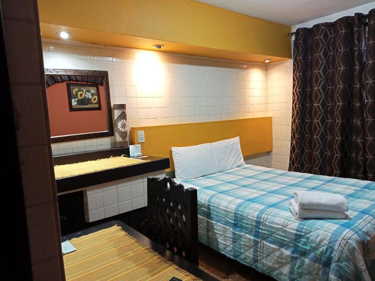 Hotel Posada El Gran Cipres - Housity