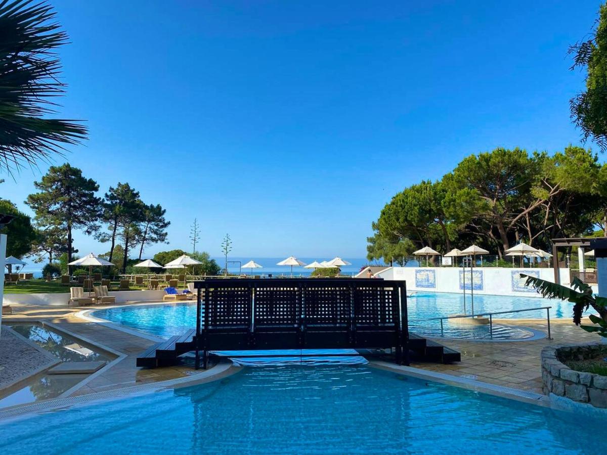 Charming House in Olhos de Agua with Shared Pool - Housity