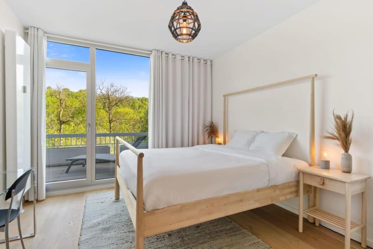 Elegant 1BR Apt, Balcony, Pool, Central Location - Housity