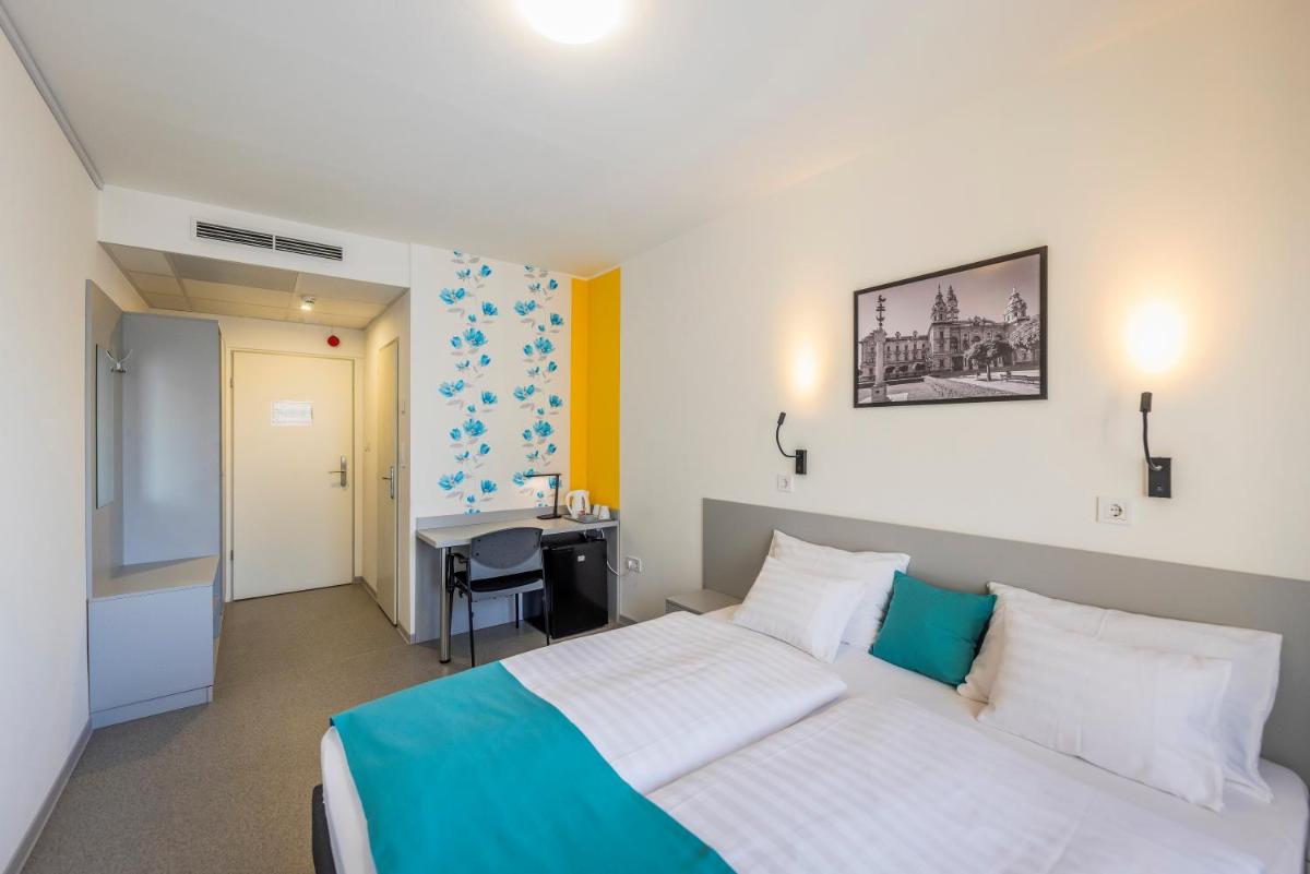Arrabona HotelRooms - Housity