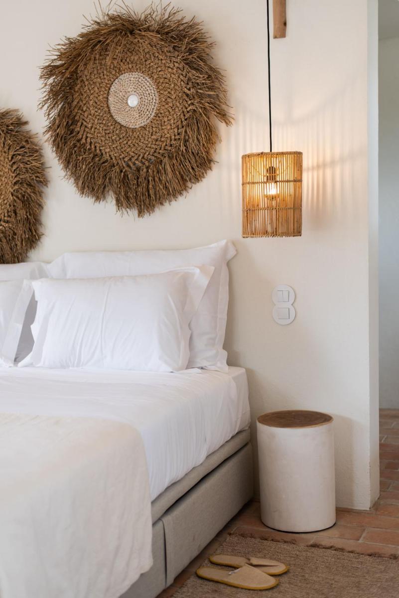Uma cama ou camas num quarto em Independente Comporta