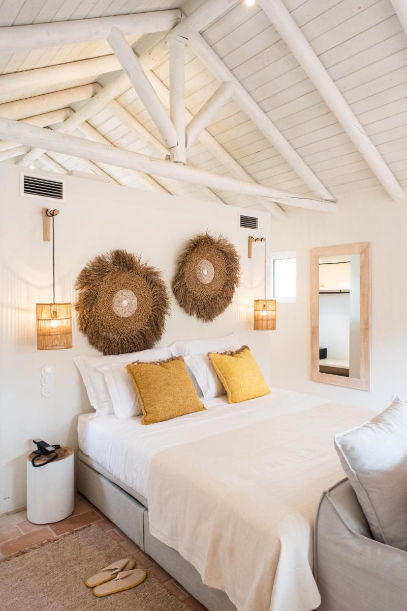 Uma cama ou camas num quarto em Independente Comporta