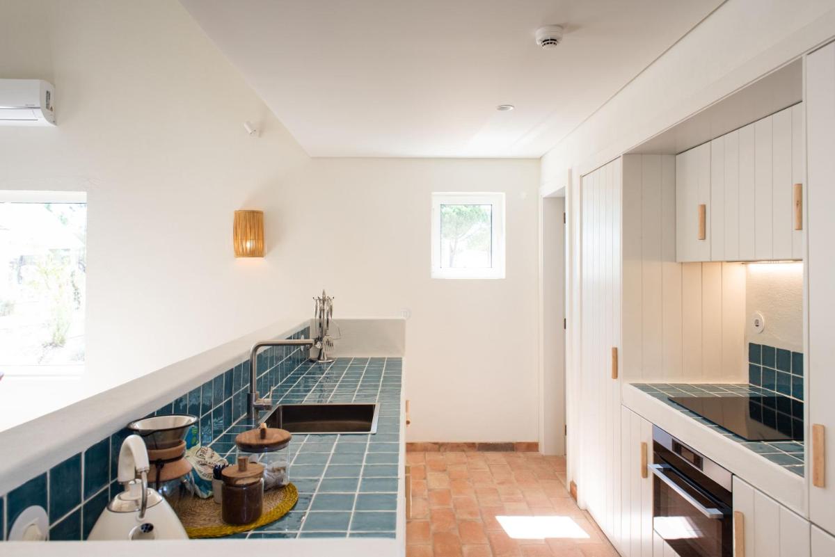 A cozinha ou kitchenette de Independente Comporta