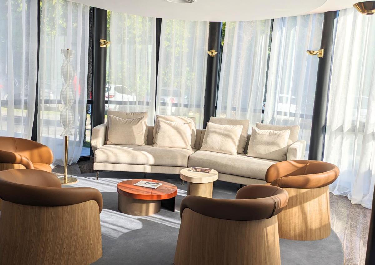 Coin salon dans l'établissement Hotel Palladia
