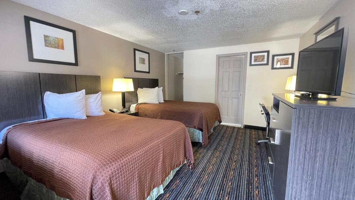 Whitney Inn & Suites - Housity