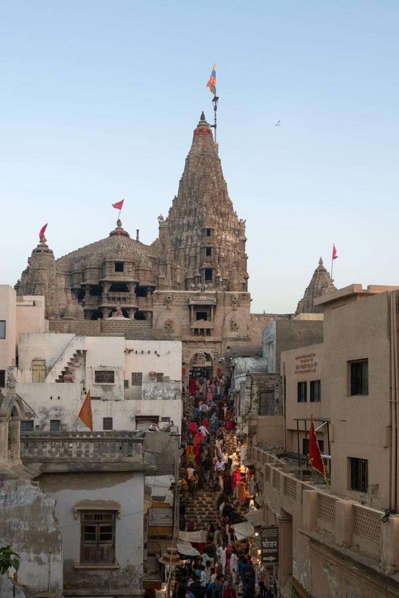 a group of people standing outside of a building at Hawthorn Suites by Wyndham Dwarka in Dwarka a group of people standing outside of a building at Hawthorn Suites by Wyndham Dwarka in Dwarka