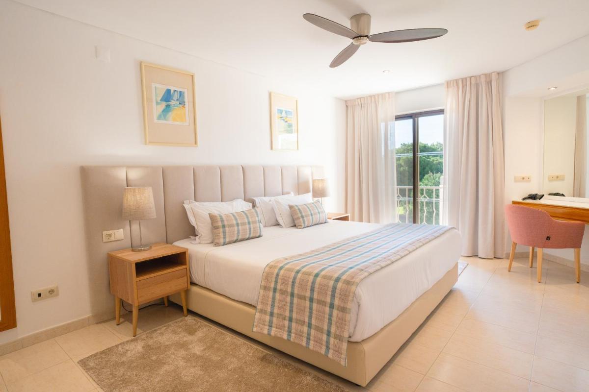 Uma cama ou camas num quarto em Four Seasons Vilamoura