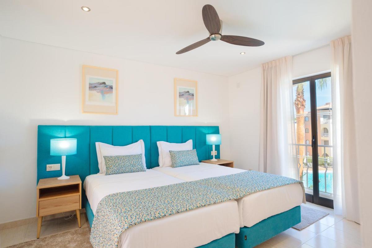 Uma cama ou camas num quarto em Four Seasons Vilamoura