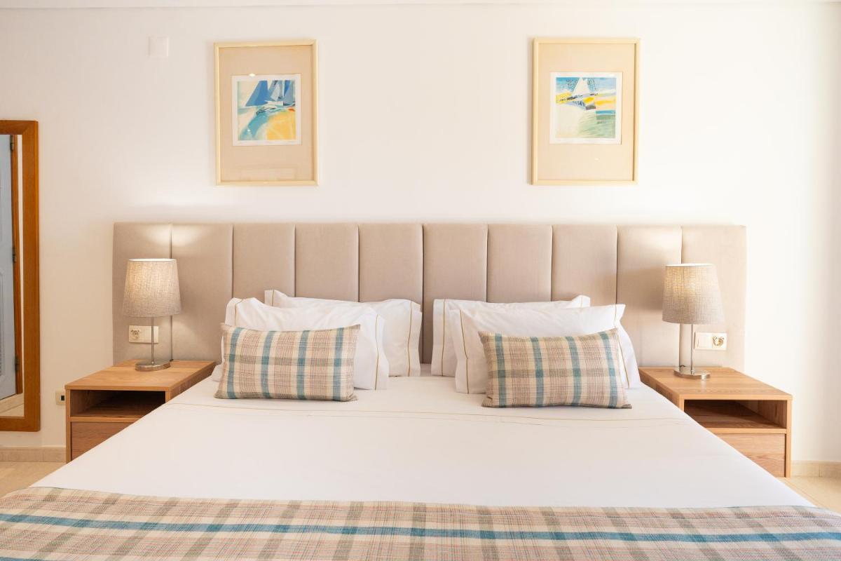 Uma cama ou camas num quarto em Four Seasons Vilamoura