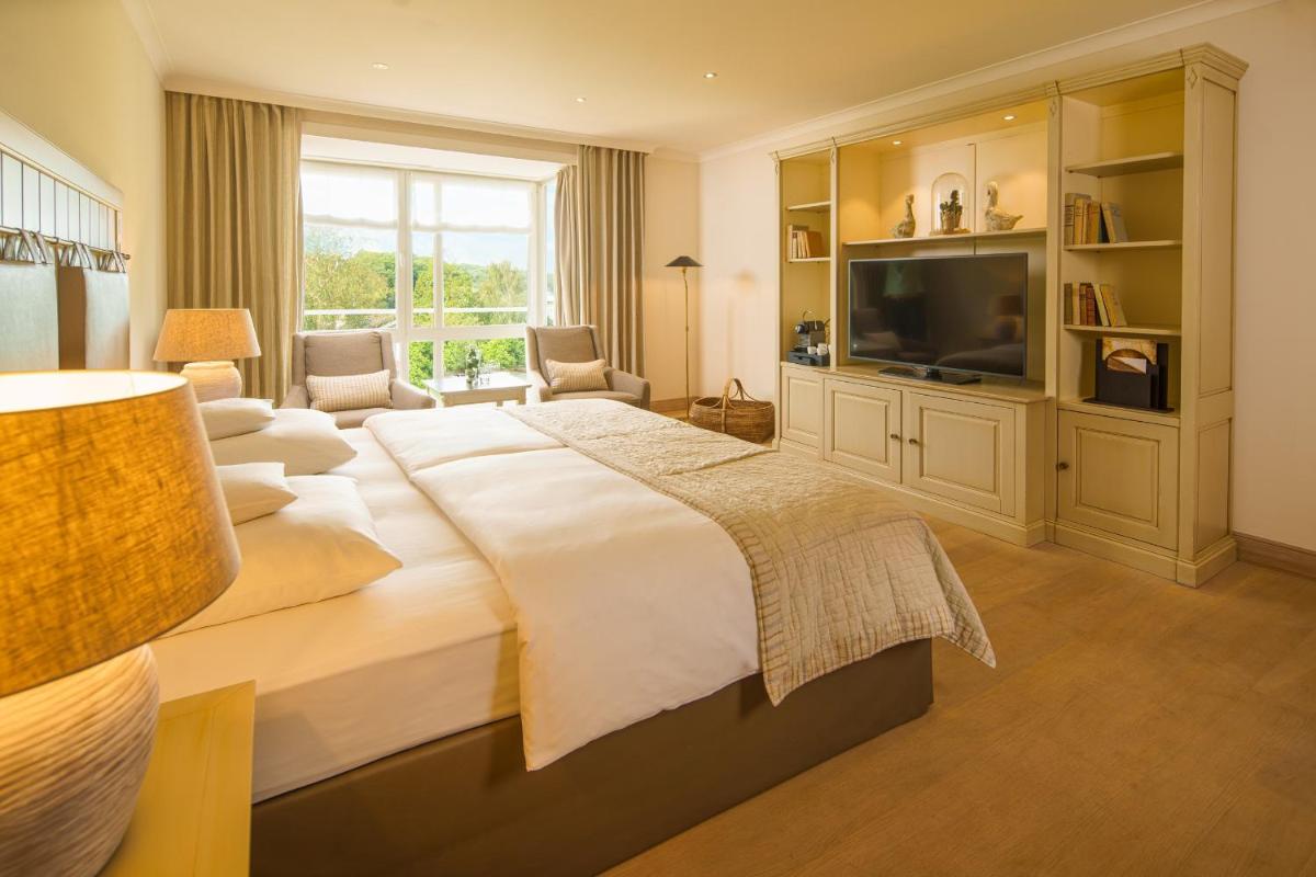 Ein Bett oder Betten in einem Zimmer der Unterkunft Alter Meierhof Glücksburg