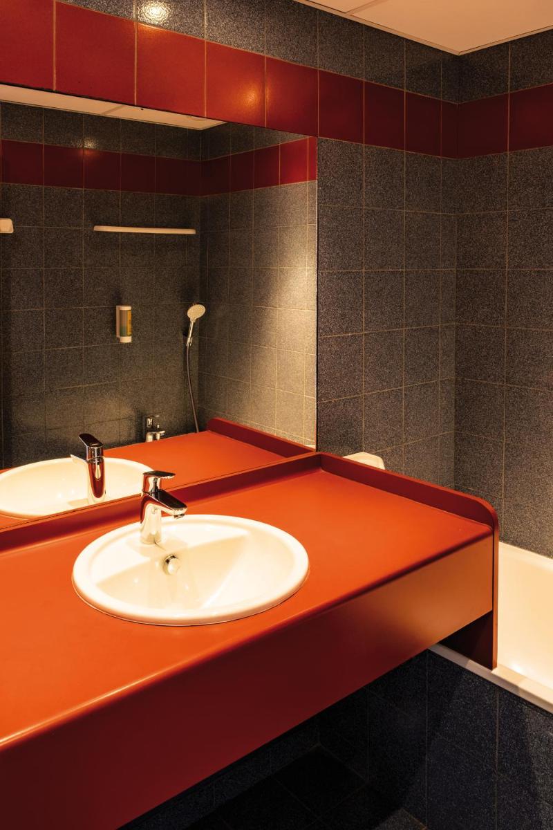 Salle de bains dans l'établissement Club Vacances Bleues Les Jardins De l'Atlantique