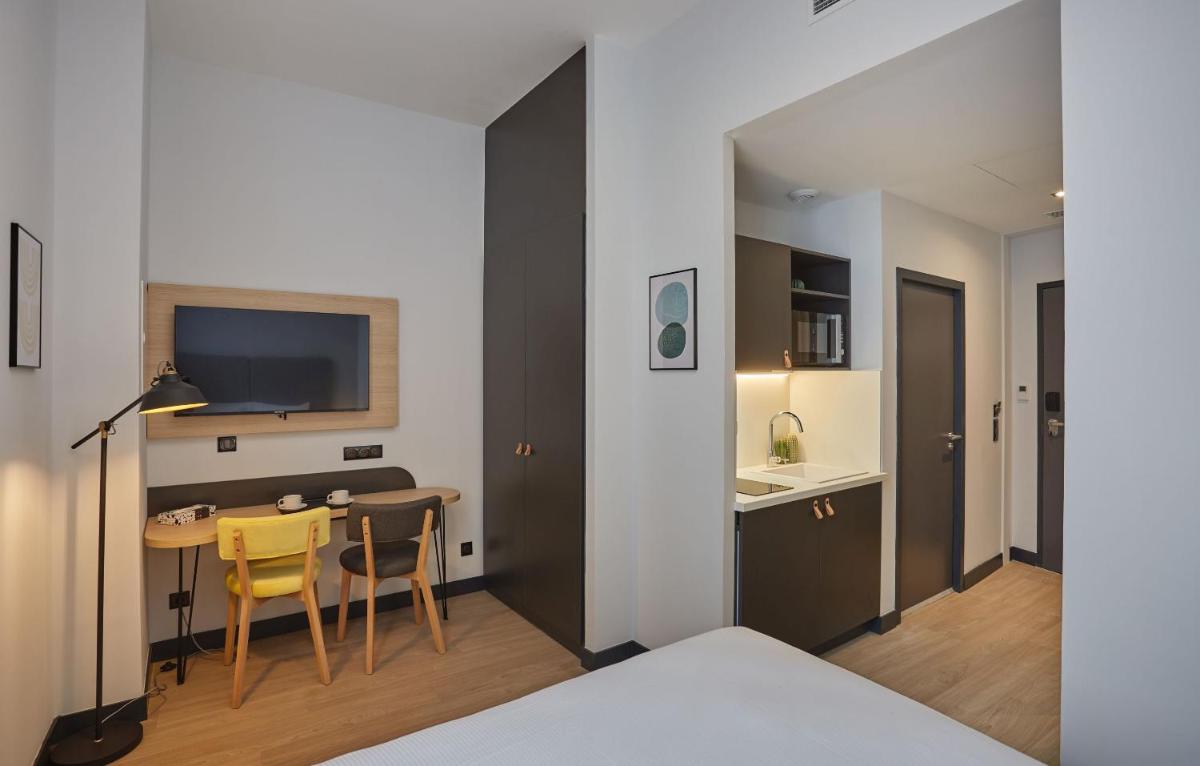 Cuisine ou kitchenette dans l'établissement Appart'hôtel Odalys City - Nîmes Arènes - Palais des Congrès