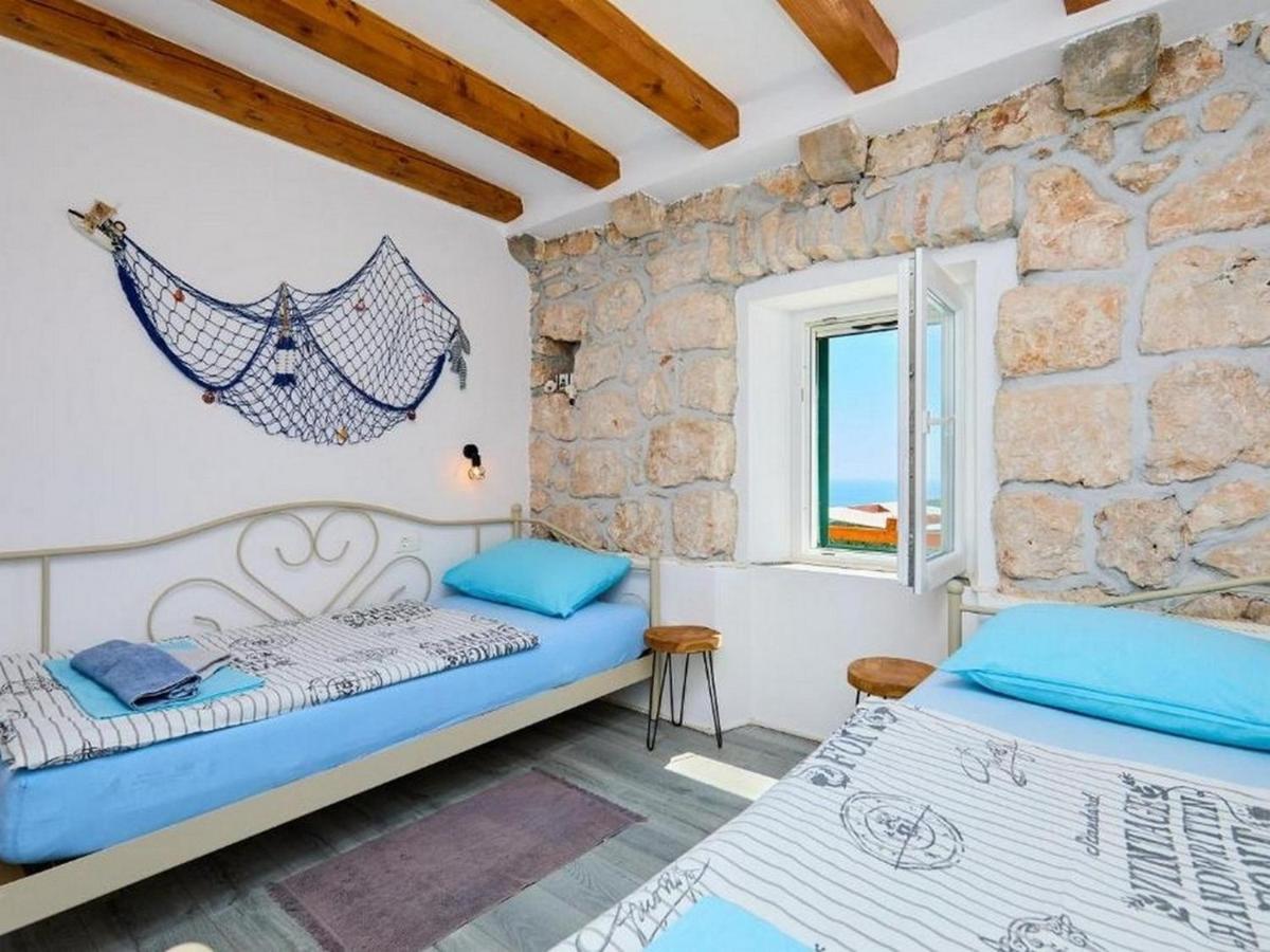 Holiday house with a parking space Babino Polje - Mljet - 22324 - Housity