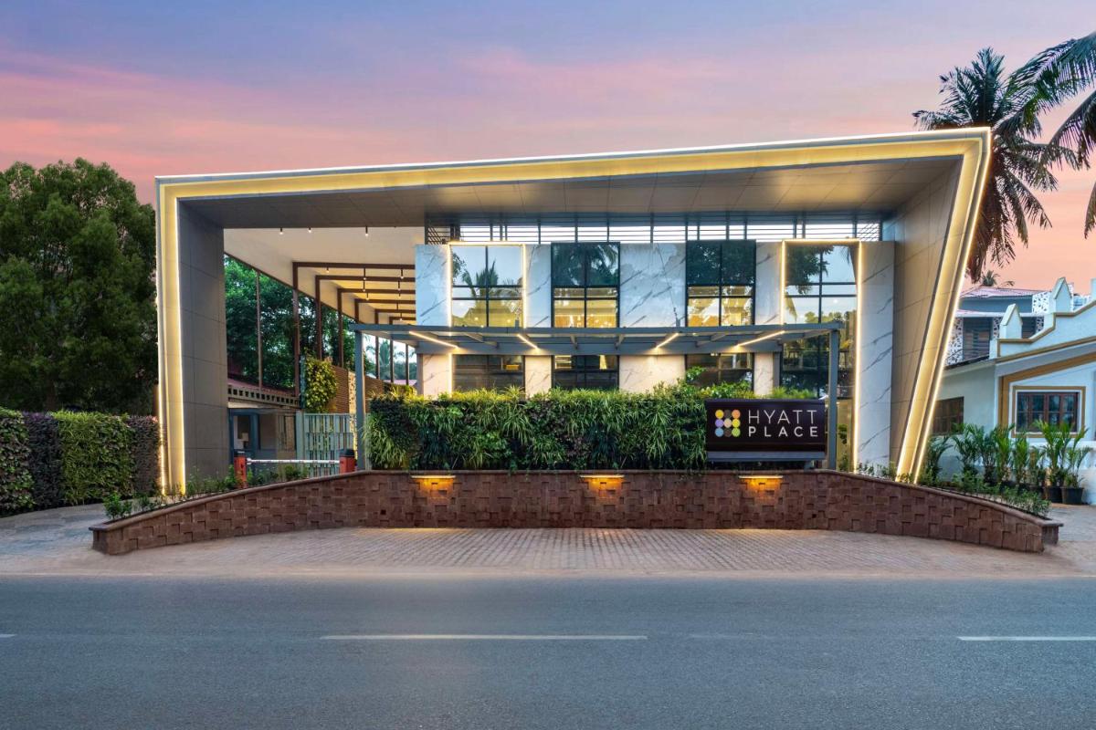 a large building with a lot of windows at Hyatt Place Goa Candolim in Candolim a large building with a lot of windows at Hyatt Place Goa Candolim in Candolim