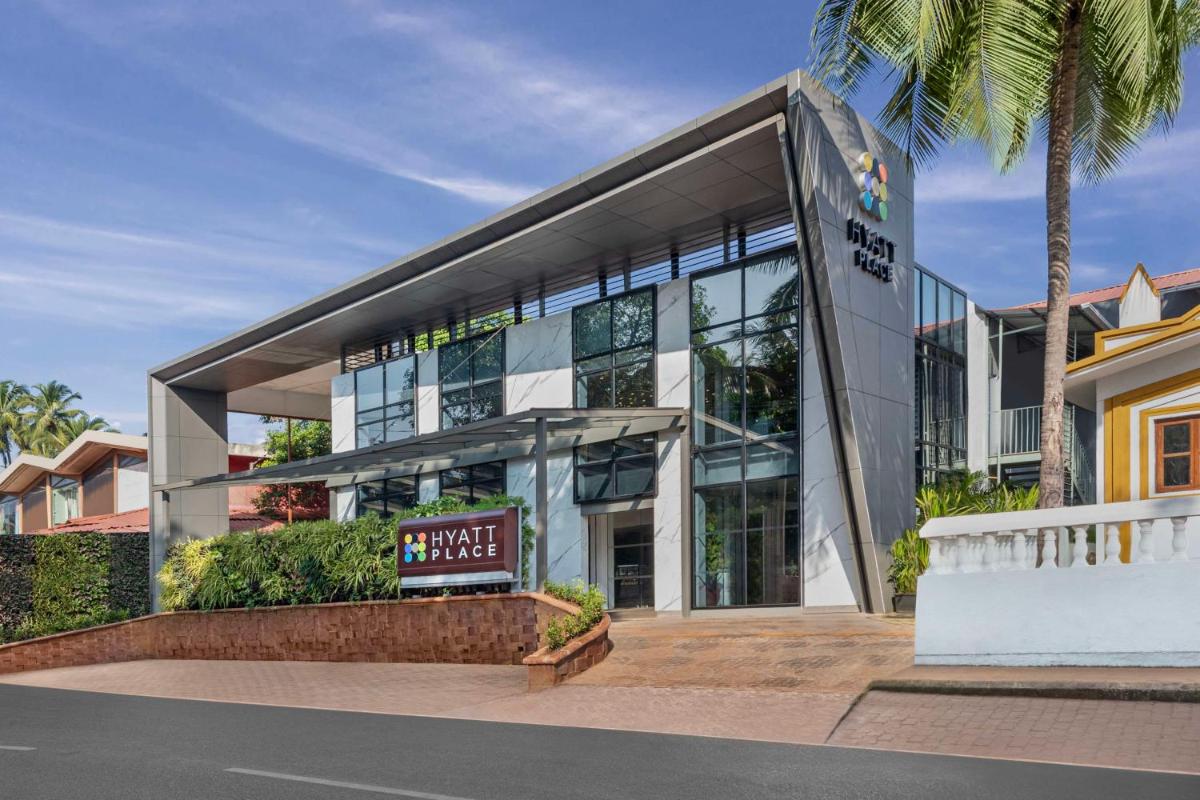 a building with a sign in front of it at Hyatt Place Goa Candolim in Candolim a building with a sign in front of it at Hyatt Place Goa Candolim in Candolim