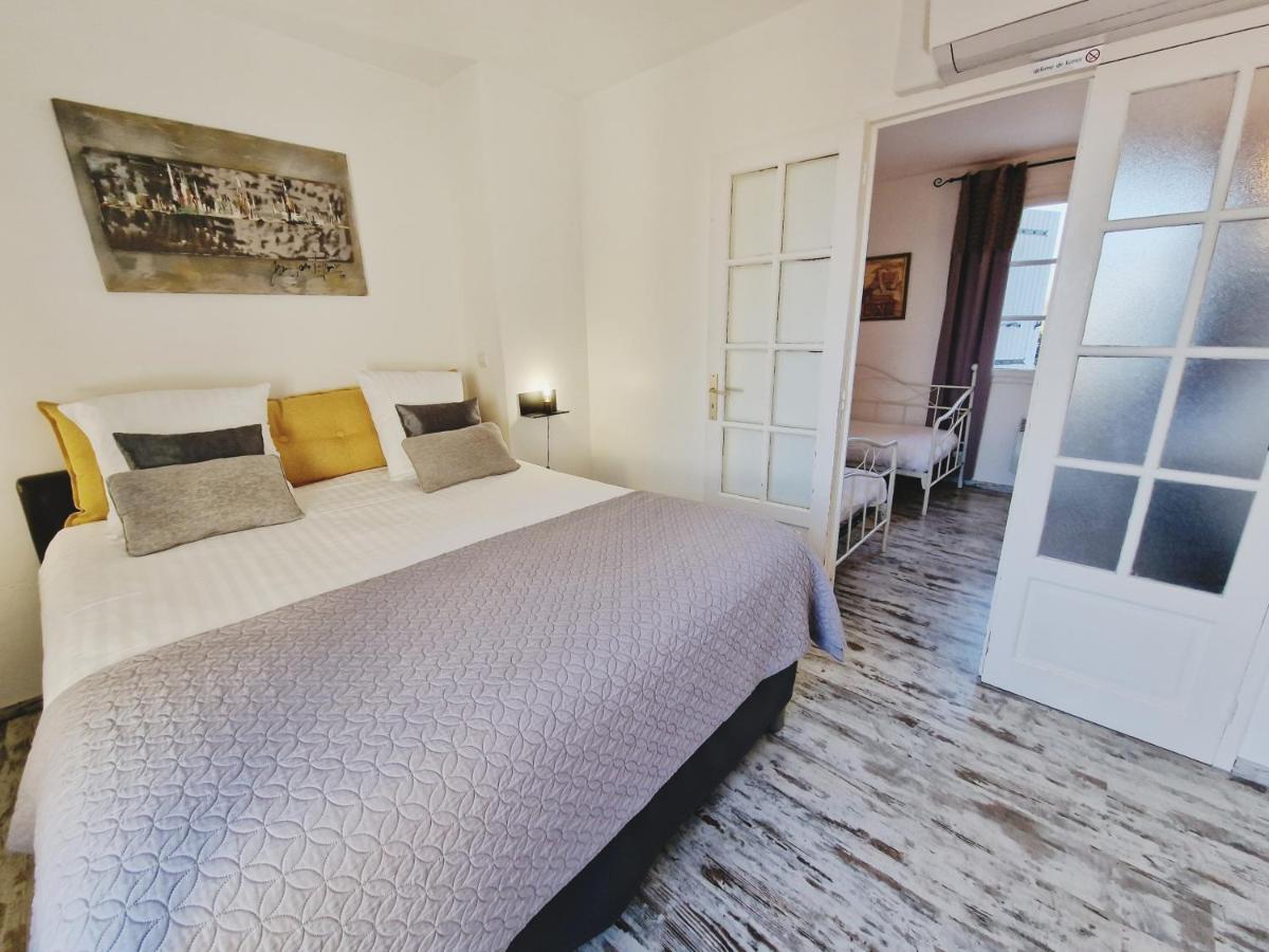 Un ou plusieurs lits dans un hébergement de l'établissement Les Terrasses de Saumur - Hôtel & Appartements - Restaurant & Spa (Logis)