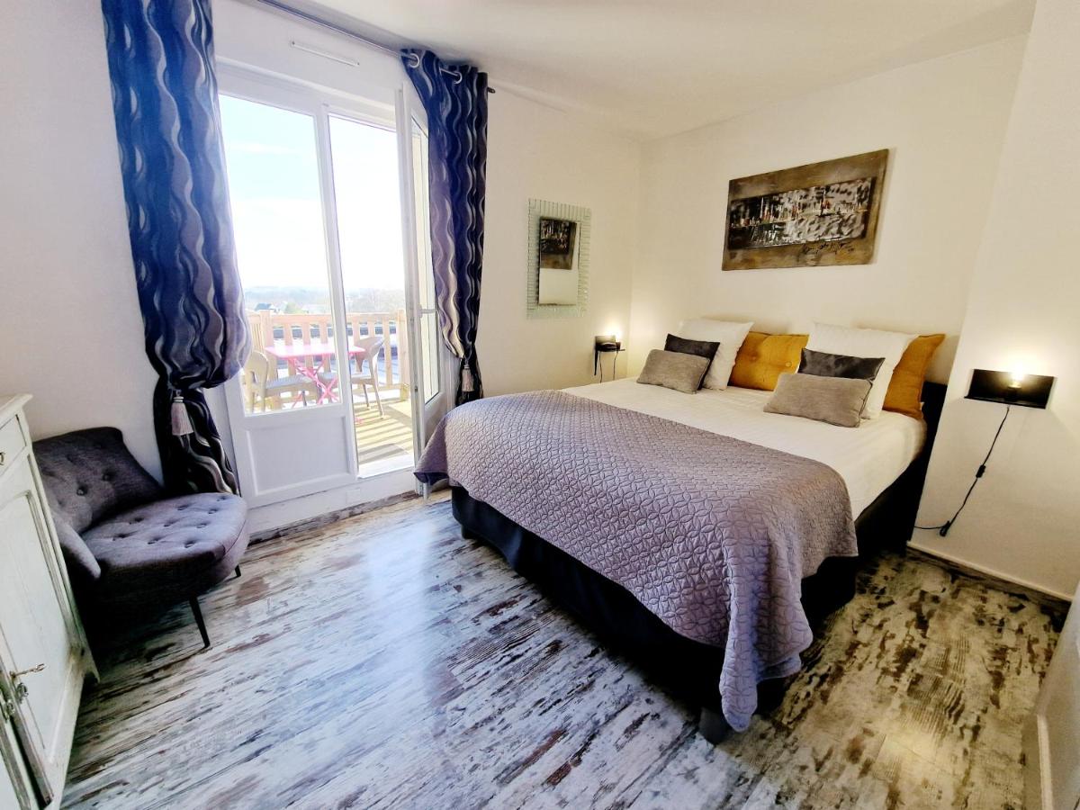 Un ou plusieurs lits dans un hébergement de l'établissement Les Terrasses de Saumur - Hôtel & Appartements - Restaurant & Spa (Logis)