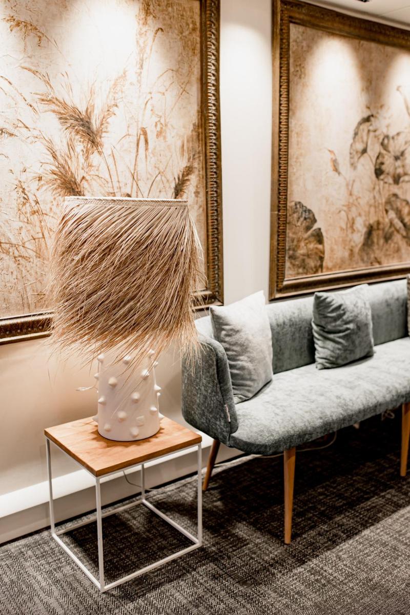 Coin salon dans l'établissement Hôtel Les Corallines - Thalasso & Resort