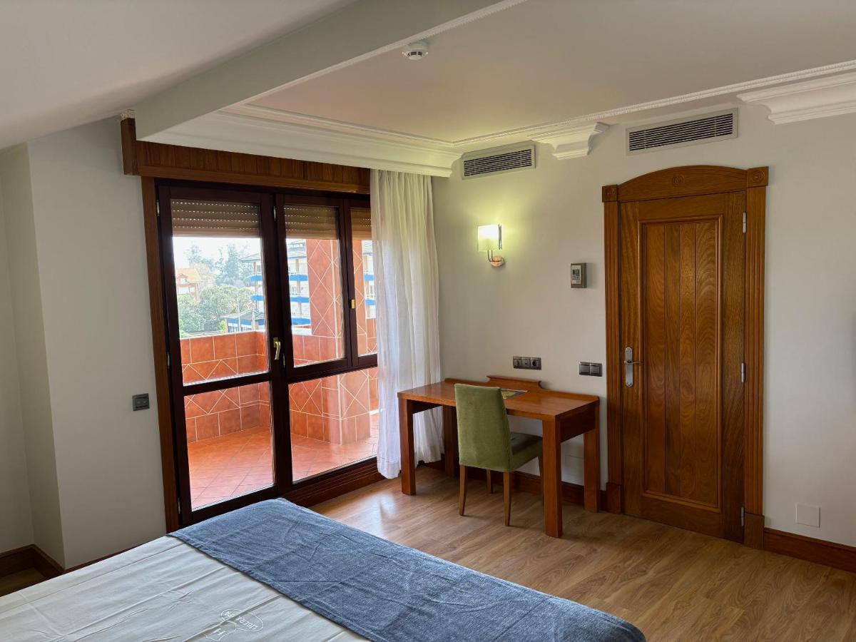 Cama o camas de una habitación en Gran Hotel Liber & Spa Playa Golf