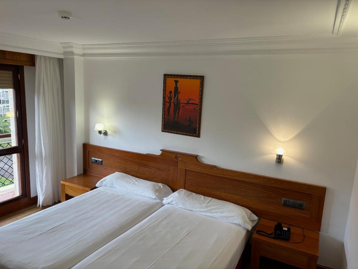 Cama o camas de una habitación en Gran Hotel Liber & Spa Playa Golf