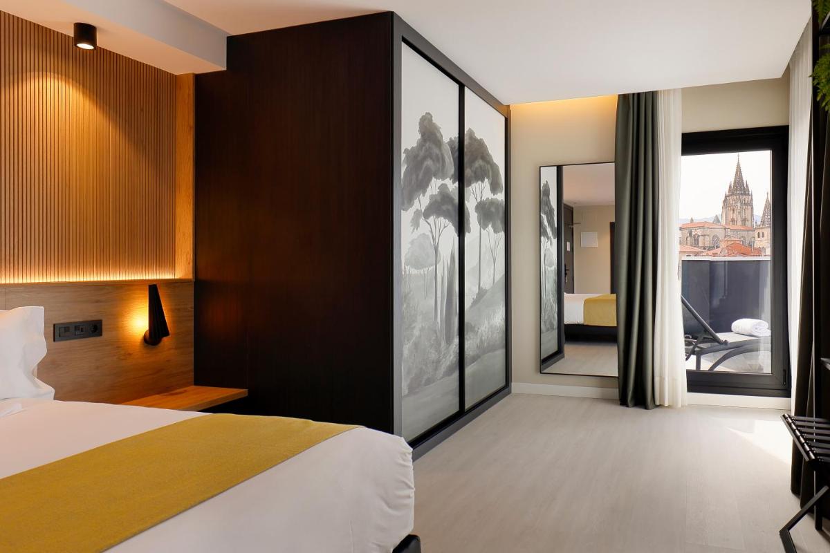 Cama o camas de una habitación en Nuvō Hotel Boutique