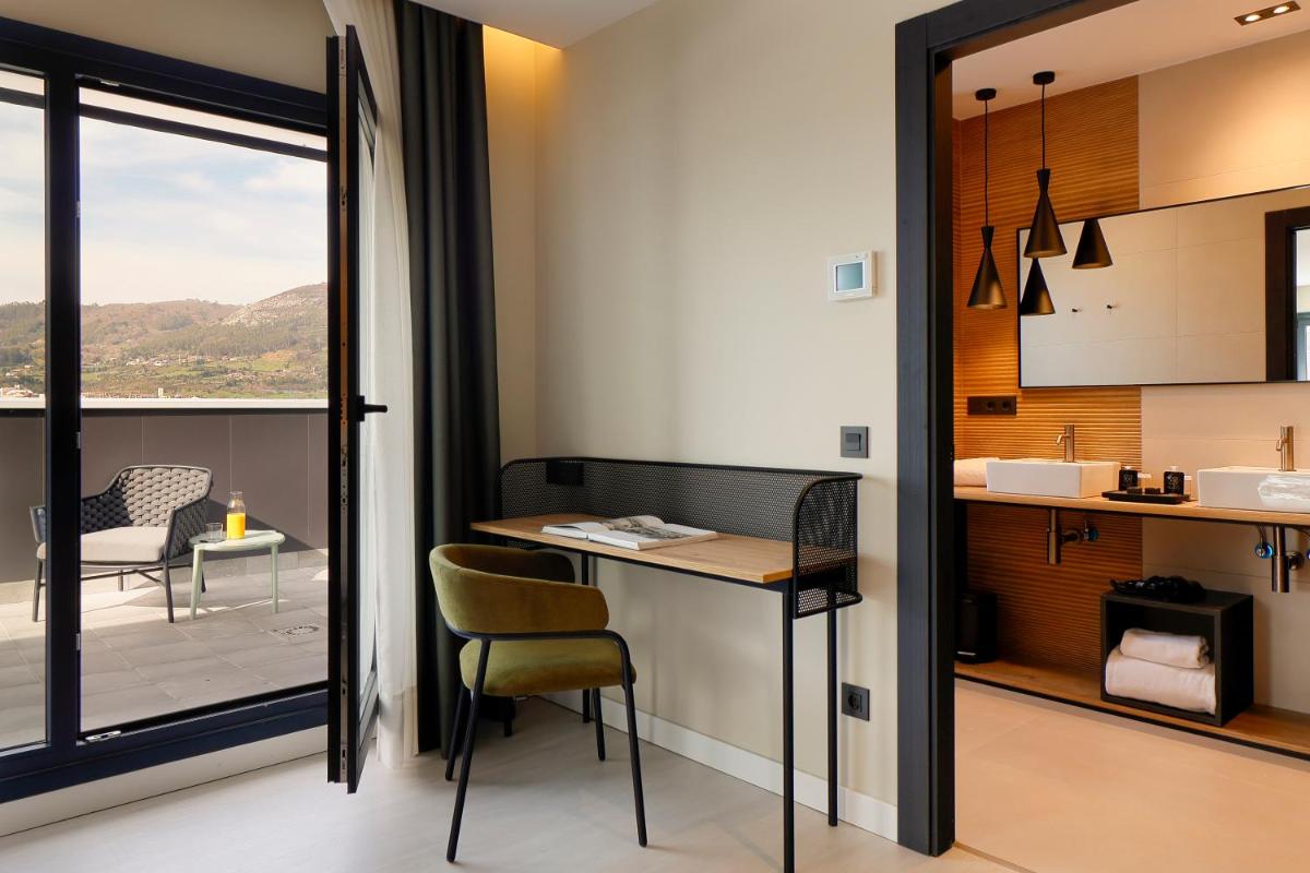 Una cocina o zona de cocina en Nuvō Hotel Boutique