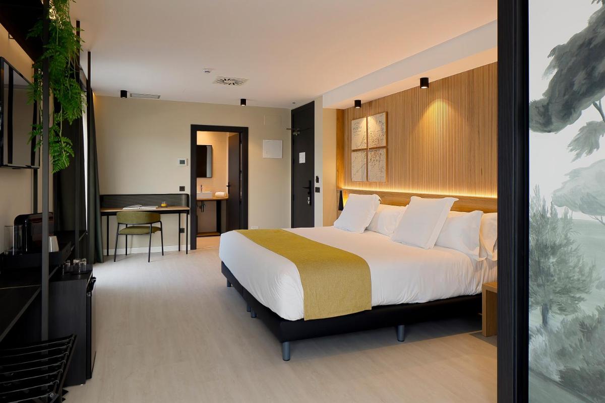 Cama o camas de una habitación en Nuvō Hotel Boutique