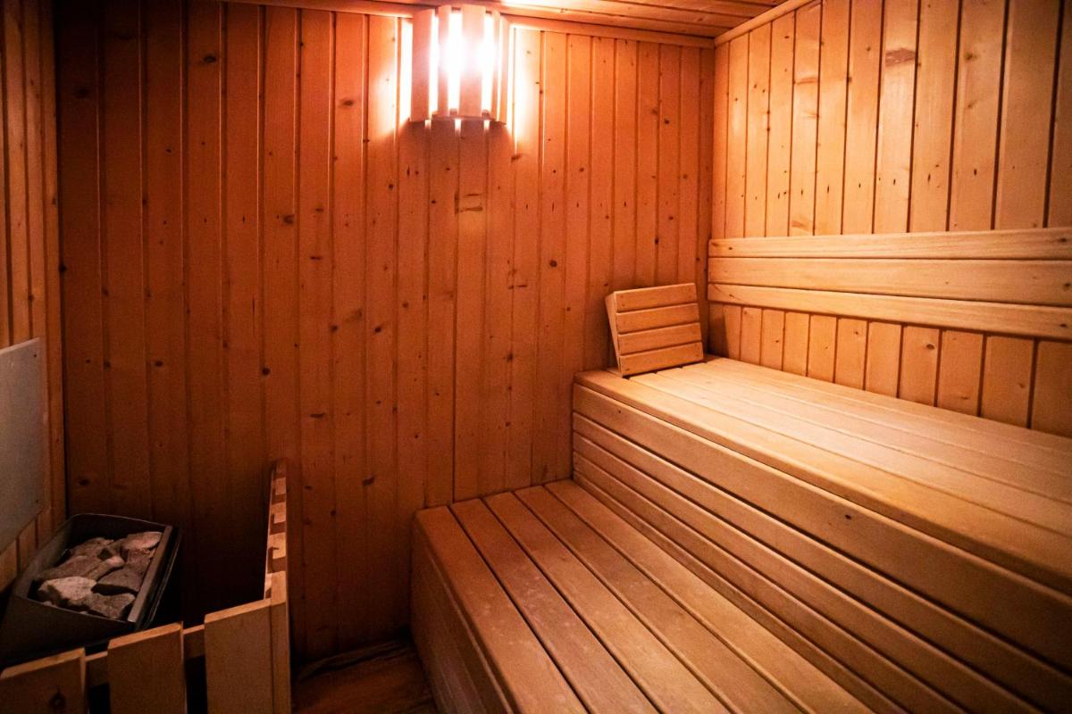 Cama o camas de una habitación en LA CASONA Encanto Rural - ApartaHotel SPA Llanes