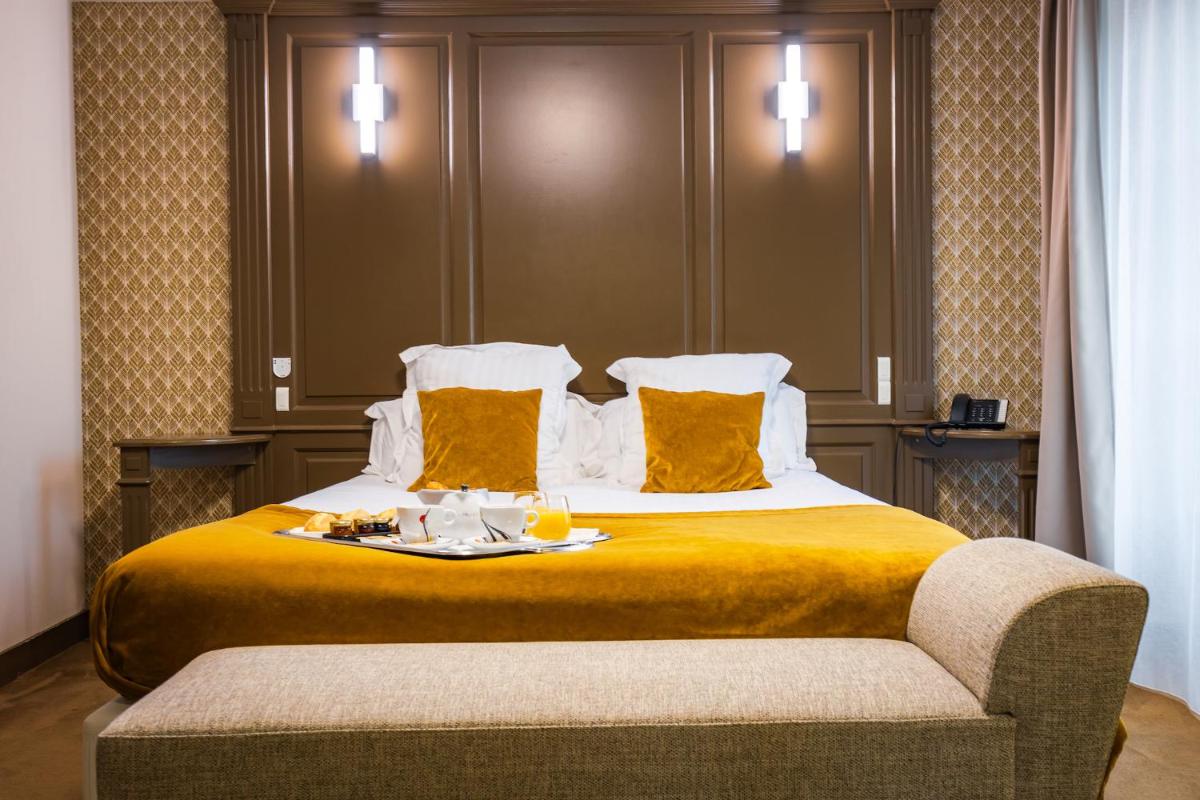 Un ou plusieurs lits dans un hébergement de l'établissement Grand Hôtel du Luxembourg & Spa