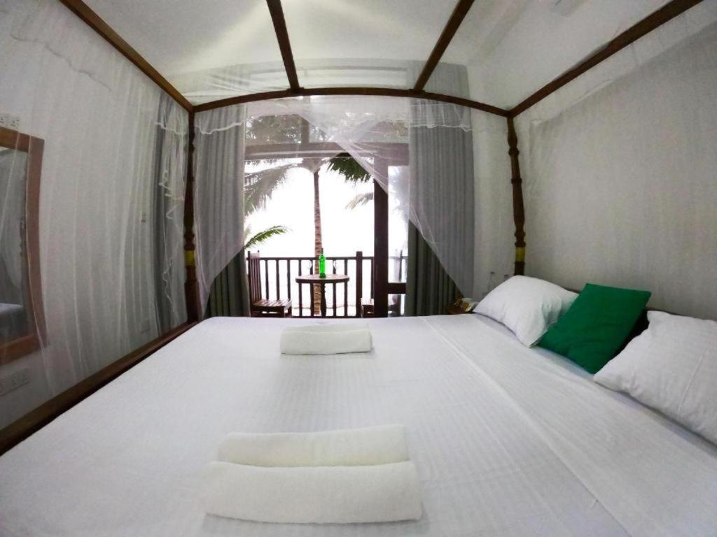 Asa Bay Beach Resort - Housity